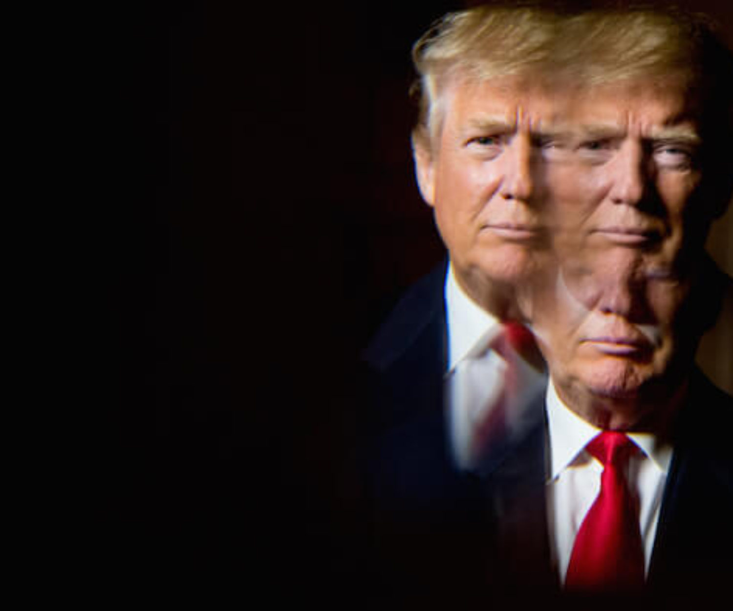 Republican presidential candidate Donald Trump, seen in reflection, poses for a portrait following an interview with the Associated Press at the Trump National Golf Club in Sterling, Va., Wednesday, Dec. 2, 2015. Trump says that if he’s elected president, he’ll know within six months whether he can achieve an elusive peace accord between Israelis and Palestinians, one of the world’s most vexing challenges. But the Republican presidential candidate says he has doubts about each side’s commitment to the peace process. (AP Photo/Andrew Harnik)