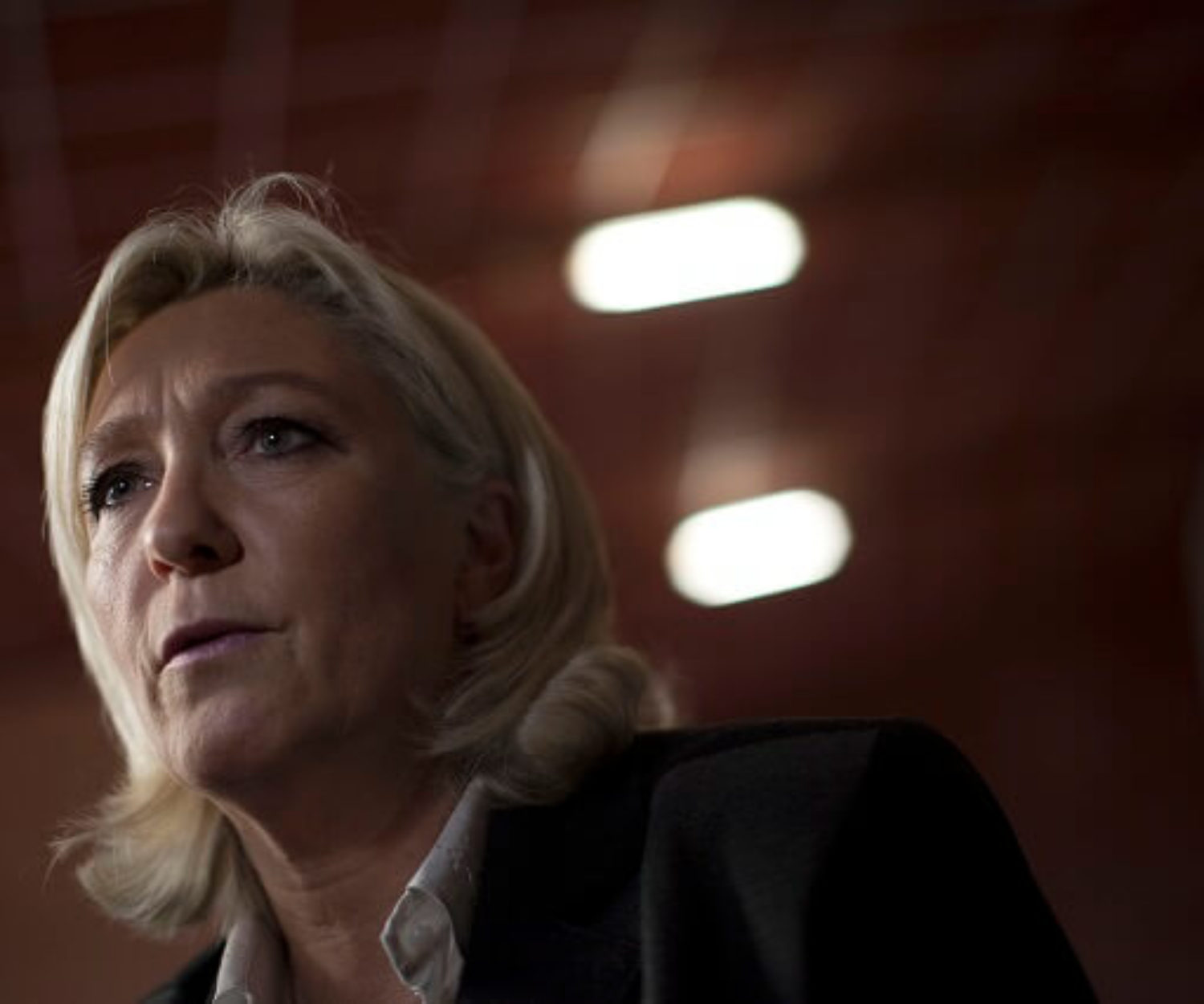 Marine Le Pen, the leader of the National Front, the largest far-right party in France, speaks to reporters at a political meeting in Perpignan, France, Feb. 15, 2014. Under Le Pen, the daughter of the party's founder, the National Front has moved from the fringe to the center of French politics by softening the party's xenophobic image. (Pierre Terdjman/The New York Times)