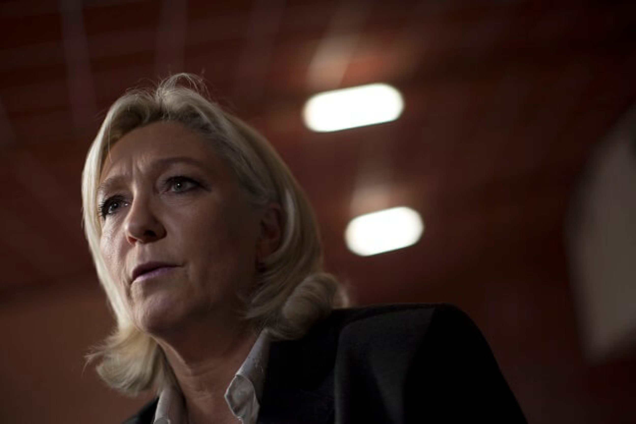 Marine Le Pen, the leader of the National Front, the largest far-right party in France, speaks to reporters at a political meeting in Perpignan, France, Feb. 15, 2014. Under Le Pen, the daughter of the party's founder, the National Front has moved from the fringe to the center of French politics by softening the party's xenophobic image. (Pierre Terdjman/The New York Times)