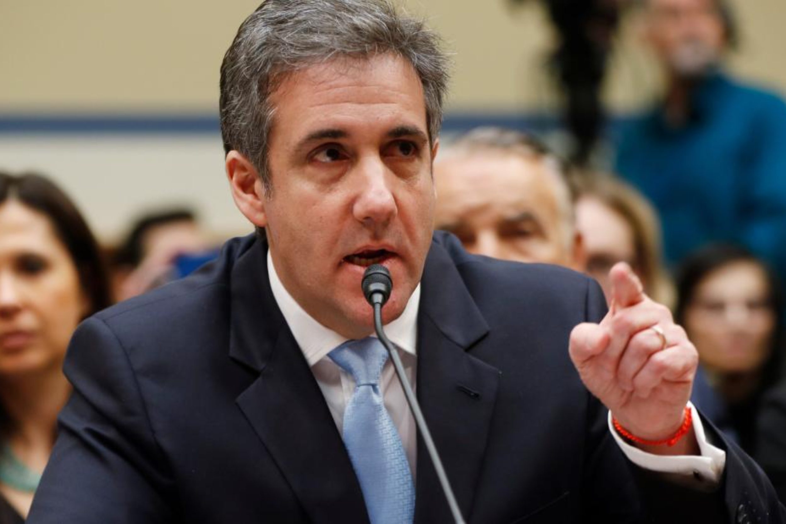 Michael Cohen, left, President Donald Trump's former lawyer, arrives to testify before the House Oversight and Reform Committee on Capitol Hill in Washington, Wednesday, Feb. 27, 2019. (AP Photo/Pablo Martinez Monsivais)